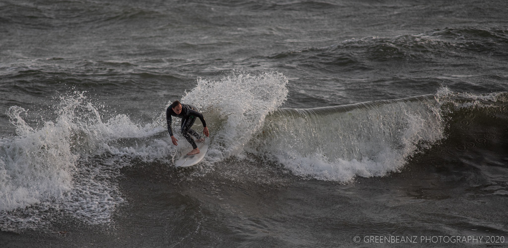 Surfer at Wembury Beach in May 2020